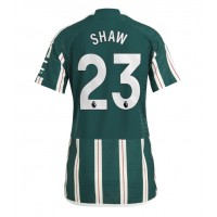 Camisa de Futebol Manchester United Luke Shaw #23 Equipamento Secundário Mulheres 2023-24 Manga Curta